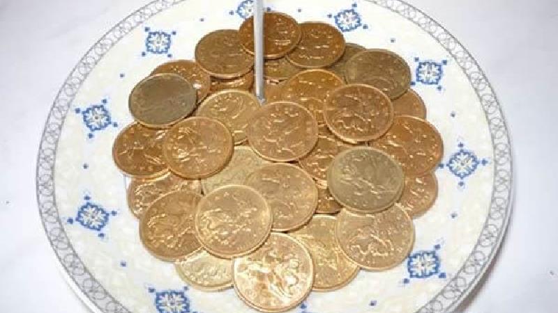 دلیل گذاشتن سکه در سفره هفت سین چیست