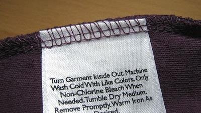 علایم روی برچسب لباس ما را چگونه راهنمایی می کنند